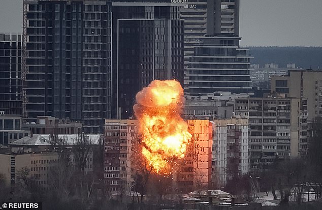 A drone hits an apartment building during a Russian missile and drone strike, amid Russia's attack on Ukraine, in Kyiv, December 27