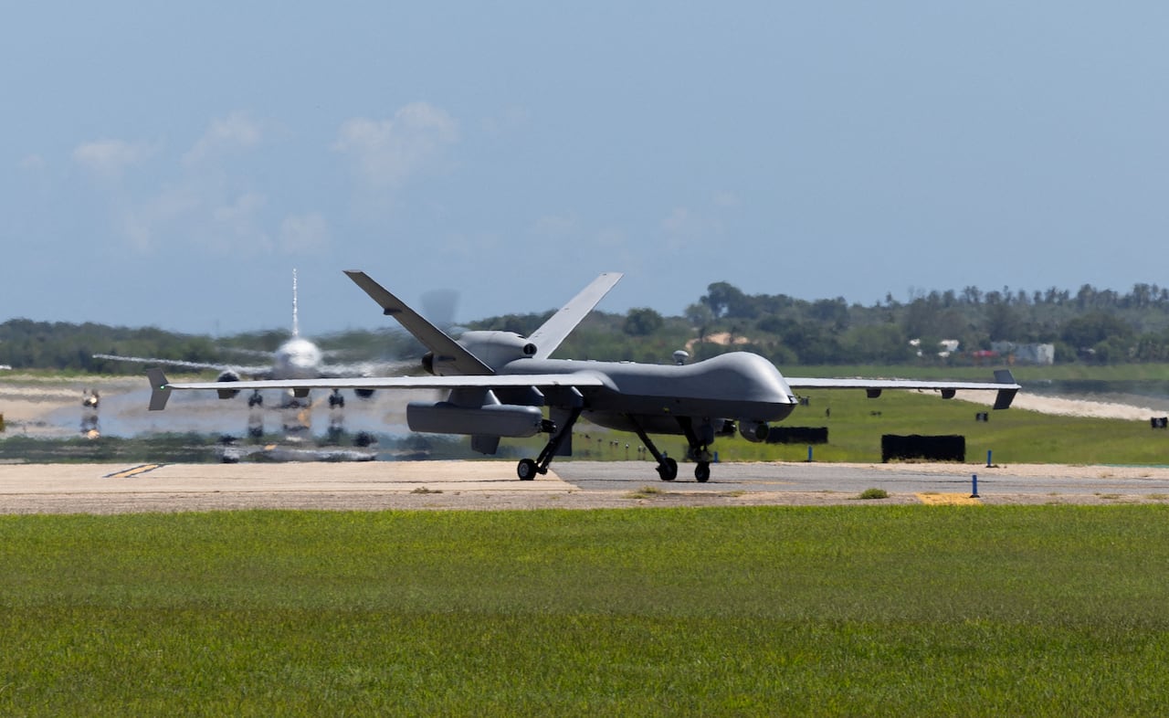 A drone is seen on an airstrip