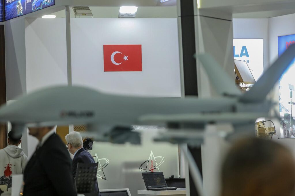 A view of TAI Anka UCAV on a stand with the Turkish flag can be seen in the background during the 4th EDEX 2025 Egypt Defense Expo in Cairo, Egypt, on December 2, 2025. (AA Photo)