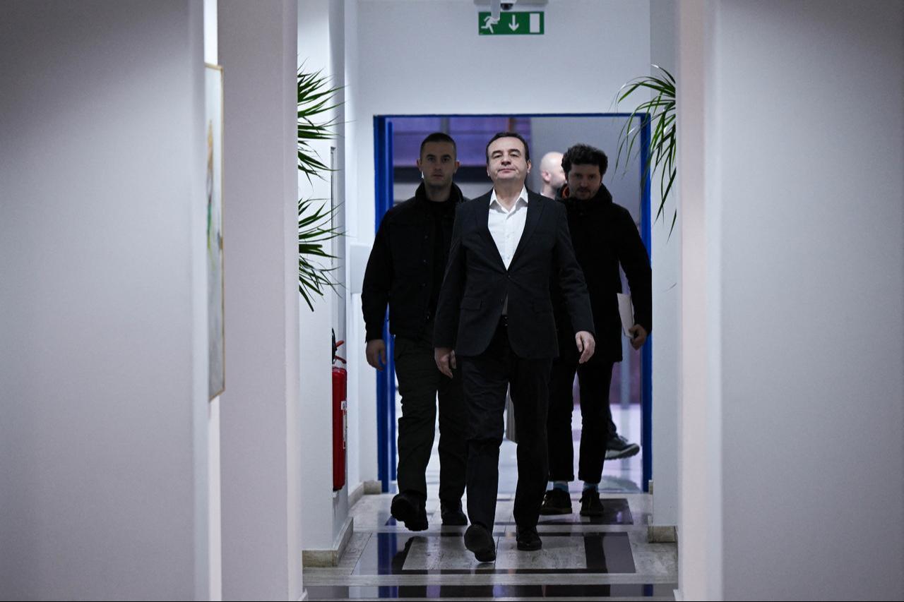 Kosovos acting Prime Minister and leader of the Vetevendosje (LVV) party, Albin Kurti (C), arrives an interview with AFP in Pristina, Kosovo on Dec. 24, 2025. (AFP Photo)