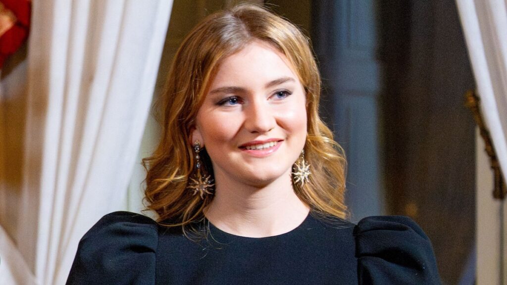 Princess Elisabeth of Belgium dazzles in sparkling festive dress with cinched waist