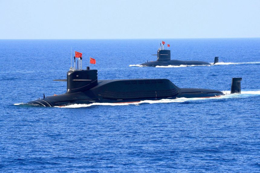 A nuclear-powered Type 094A Jin-class ballistic missile submarine of the Chinese People's Liberation Army (PLA) Navy navigates during a military display in the South China Sea.