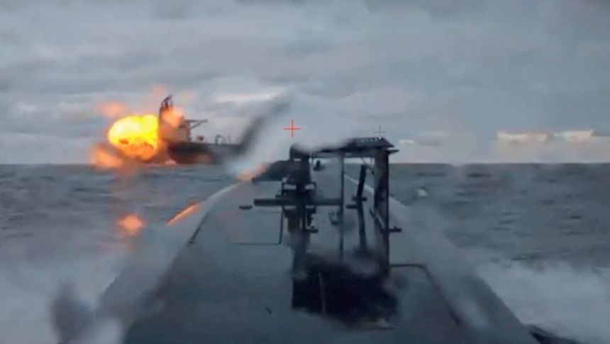 A Ukrainian sea drone shows the Dashan, a sanctioned oil tanker, being struck by another sea drone in the Black Sea on Tuesday, in a still from a video shared by Ukraine's Security Service.