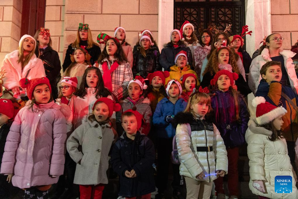 People take part in Santa Walk in Tripoli, Greece-Xinhua