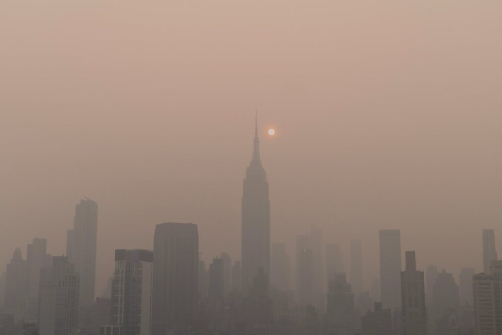 Urban haze highlights the growing intersection of climate change, public health, and infrastructure risk. Credit: Unsplash+