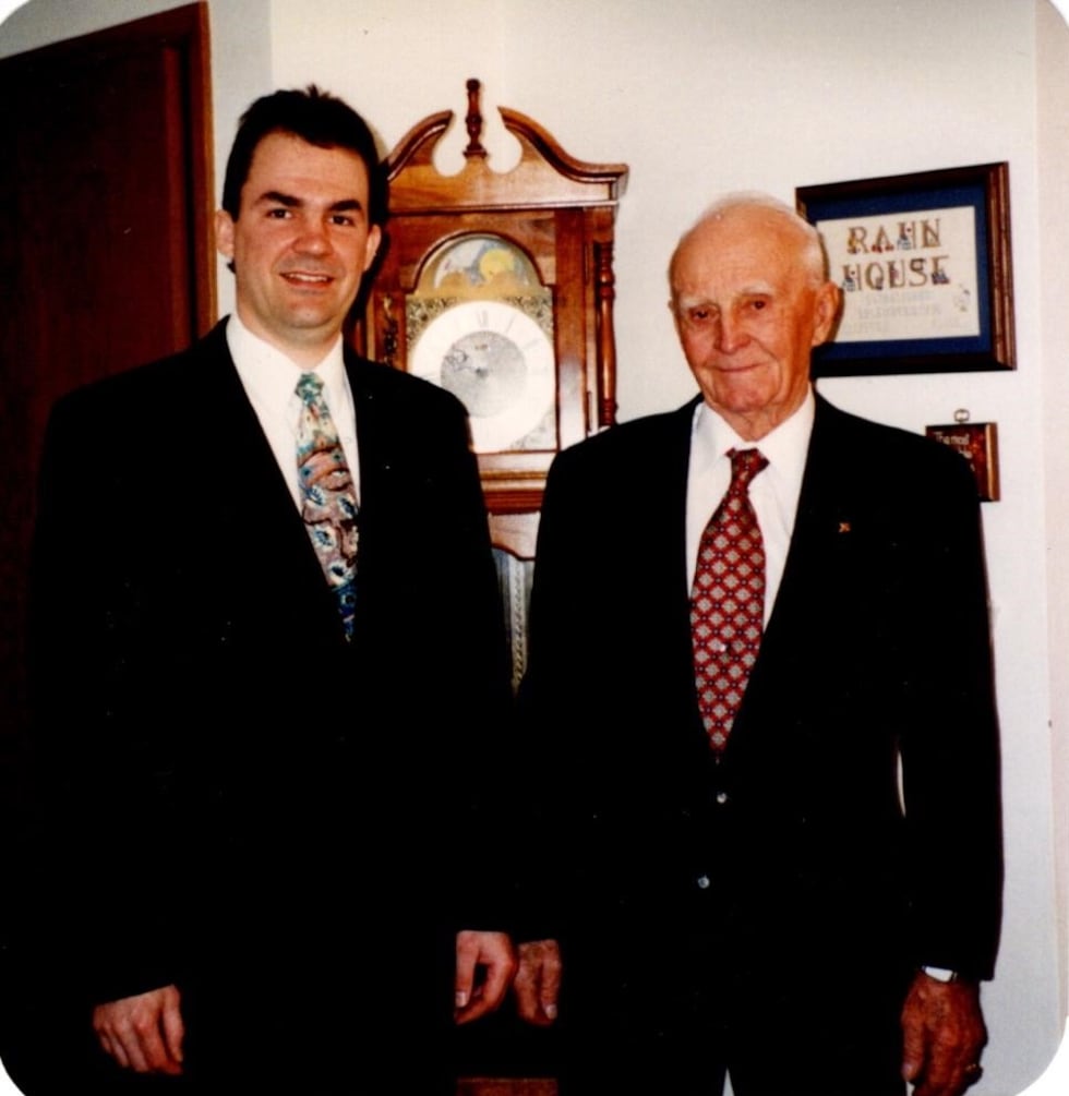 Tim Yerkey and his grandfather, Clifford Rahn, who farmed the family land starting in the...