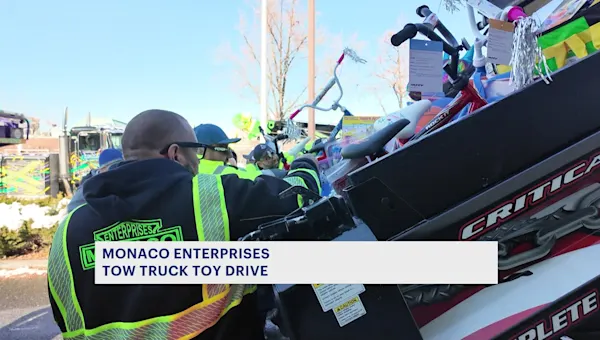 Monaco Enterprises truck toy drive loads truck full of toys for children's hospitals