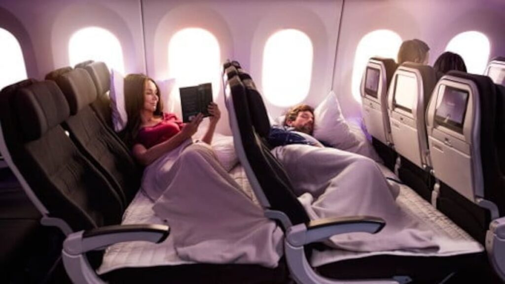 Woman wheeled off Air NZ plane with swollen legs after Skycouch seat cancelled, CEO apologises