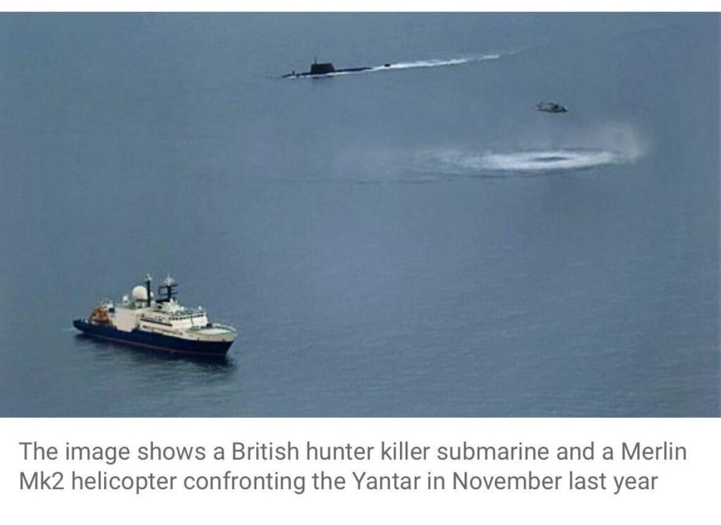 Newly declassified images show British Royal Navy submarine and Merlin helicopter next to the Russian spy ship Yantar in the Irish Sea. The Merlin helicopter was also looking for a Russian submarine. It was near a UK-Ireland gas pipe.
