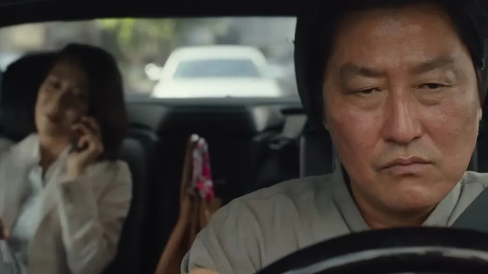  Song Kang-ho driving Cho Yeo-jeong in Parasite. 