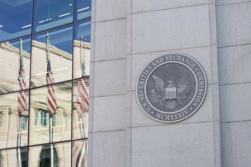 The devil of proposed SEC AI disclosure rule is in the details Washington, DC, USA - June 25, 2022: The logo of the U.S. Securities and Exchange Commission (SEC) is seen at its headquarters in Washington, DC.