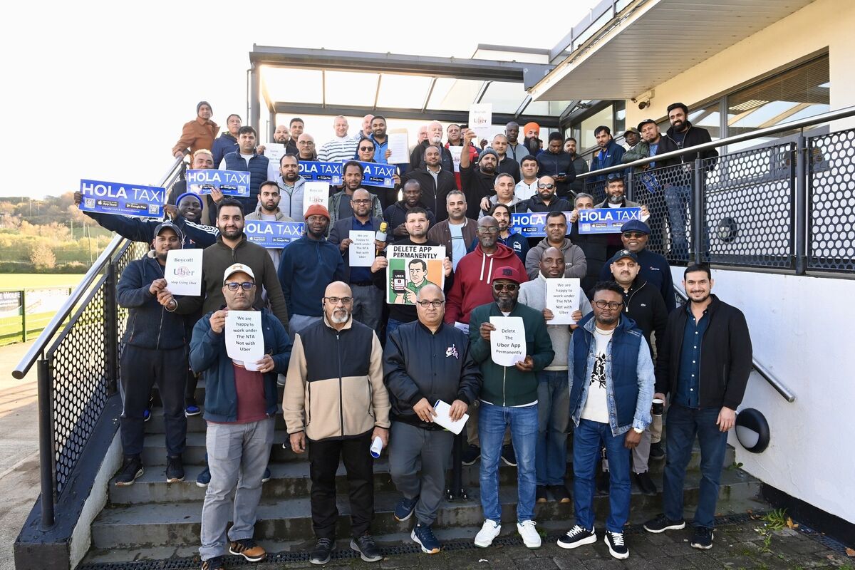 Suleman Ahmed, Bobby Lynch, and other Cork taxi drivers delivered a letter to Taoiseach Micheál Martin's office after a meeting at Nemo Rangers. Their letter said: 'Review all app-based taxi fare systems to ensure full compliance with Irish regulations, enforce transparency and fairness in pricing, and invest in a publicly managed NTA taxi-hailing app as an Irish-controlled, regulated alternative for passengers and licensed drivers.' Picture: Larry Cummins