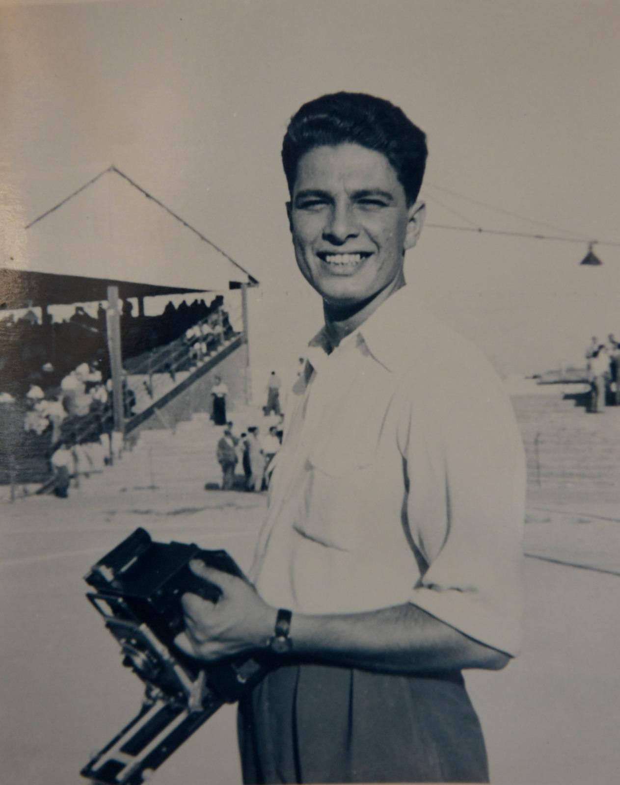 A young Attard, camera in hand.
