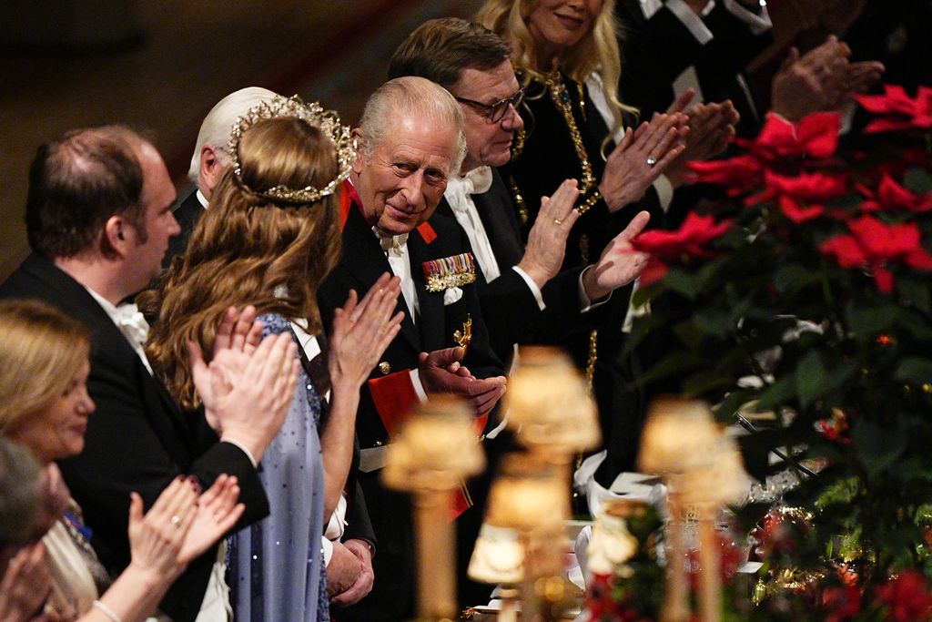 King Charles III, Germany's President Frank-Walter Steinmeier and Catherine, Princess of Wales during the state banquet