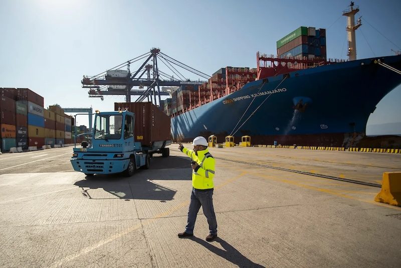 A worker at Aqaba container terminal. Jordan's fiscal performance remains in line with IMF targets, the organisation said