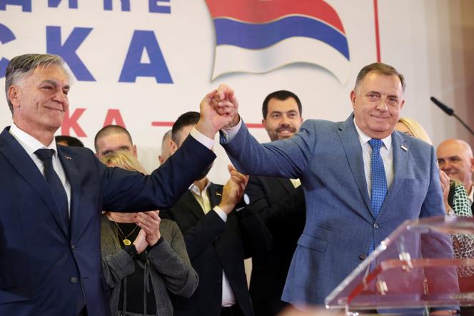 Milorad Dodik, former President of the Bosnian Serb Republic, and Sinisa Karan attend a press conference after preliminary results indicated Karan won a snap presidential election in Banja Luka, Bosnia and Herzegovina, November 23, 2025.