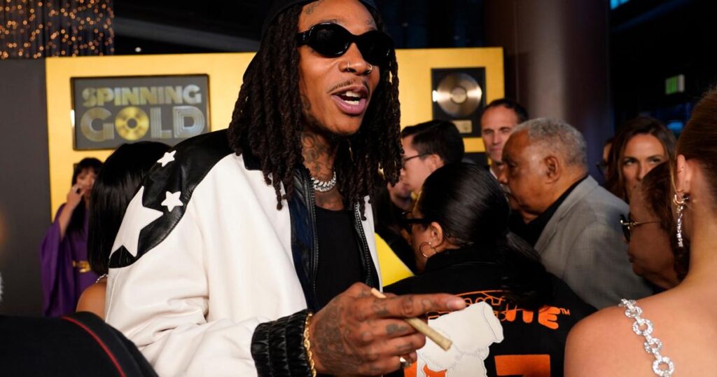 Romanian court sentences US rapper Wiz Khalifa to 9 months for drug possession | Local News