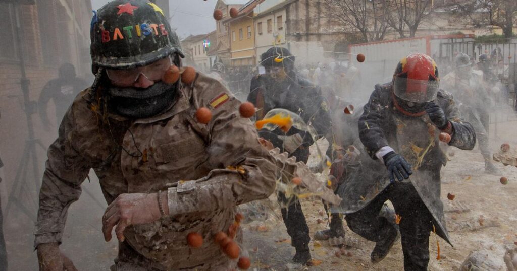 Photos show flour, eggs and firecrackers flying at Spain's Els Enfarinats festival | World