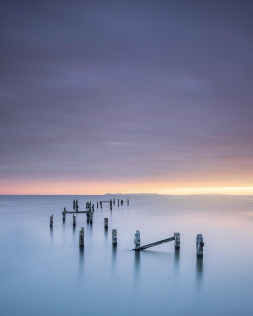 'A Still Dawn Over The Old Pier', England [OC], [1167x1459].