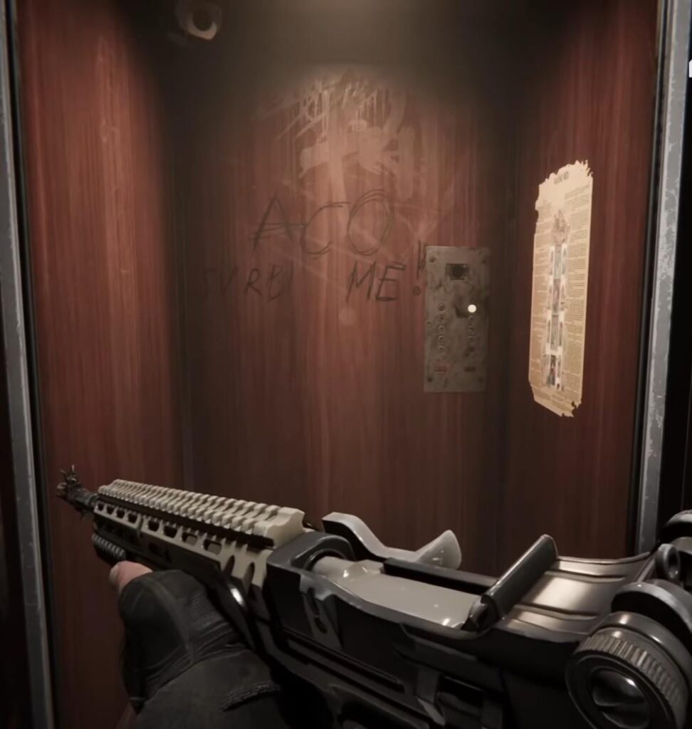 Screenshot from the game AAU Black Site, in the elevator it says Aco itches :)