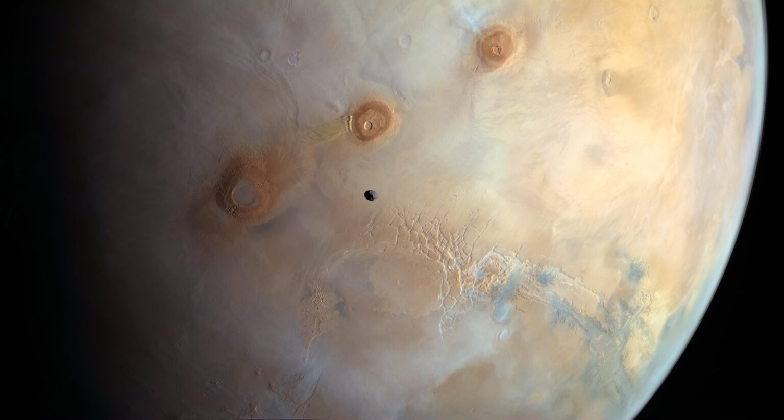 Phobos Over Tharsis and Valles Marineris, imaged by ESA Mars Express