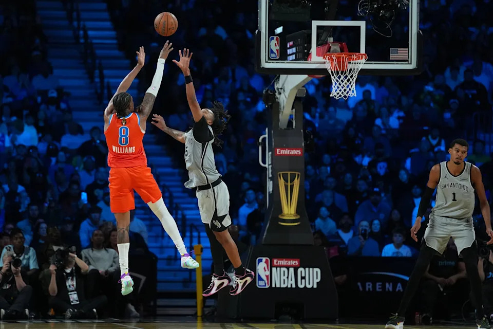 Dec 13, 2025; Las Vegas, Nevada, USA; Oklahoma City Thunder guard Jalen Williams (8) shoots over San Antonio Spurs guard Stephon Castle (5) during the fourth quarter at T-Mobile Arena. Mandatory Credit: Kirby Lee-Imagn Images