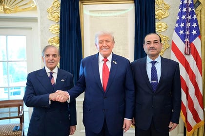 This handout photograph released by Pakistan's Prime Minister Office on September 26, 2025, shows Pakistan's Prime Minister Shehbaz Sharif (L), Army Chief and Field Marshal Syed Asim Munir (R) posing with U.S. President Donald Trump (C) at the White House in Washington, D.C.
