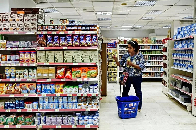FILE: A woman shops at a supermarket in Cairo, 2 November 2016