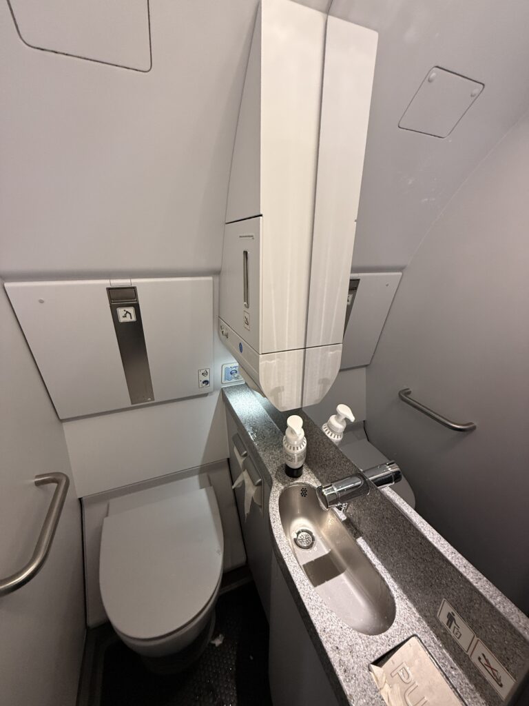 A typically small aircraft lavatory is seen here.