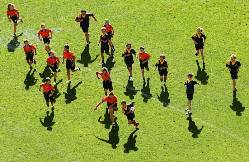 Children at play in the real world. Photograph: Scott Barbour/Getty Images