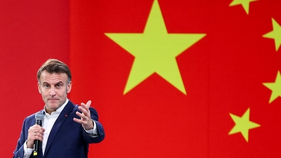 French President Emmanuel Macron speaks at Sichuan University, with China's flag in background, during a meeting with students in Chengdu, in southwestern China's Sichuan province.(AFP)