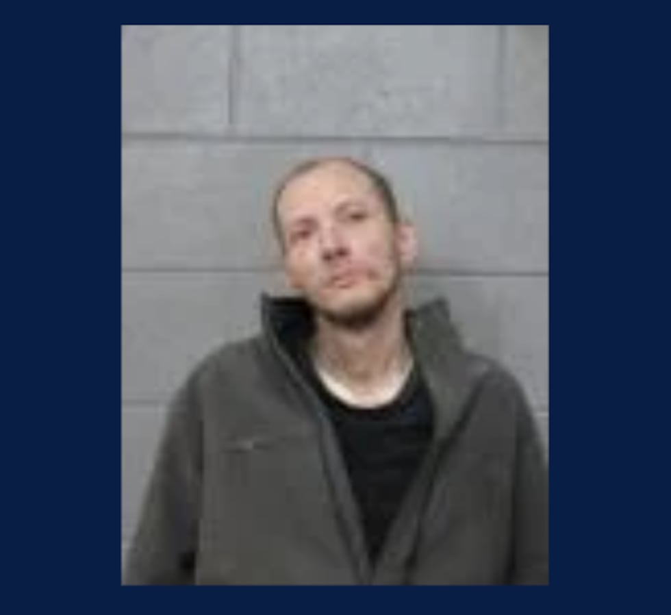 Ryan Ozga was charged with two counts of second-degree burglary.