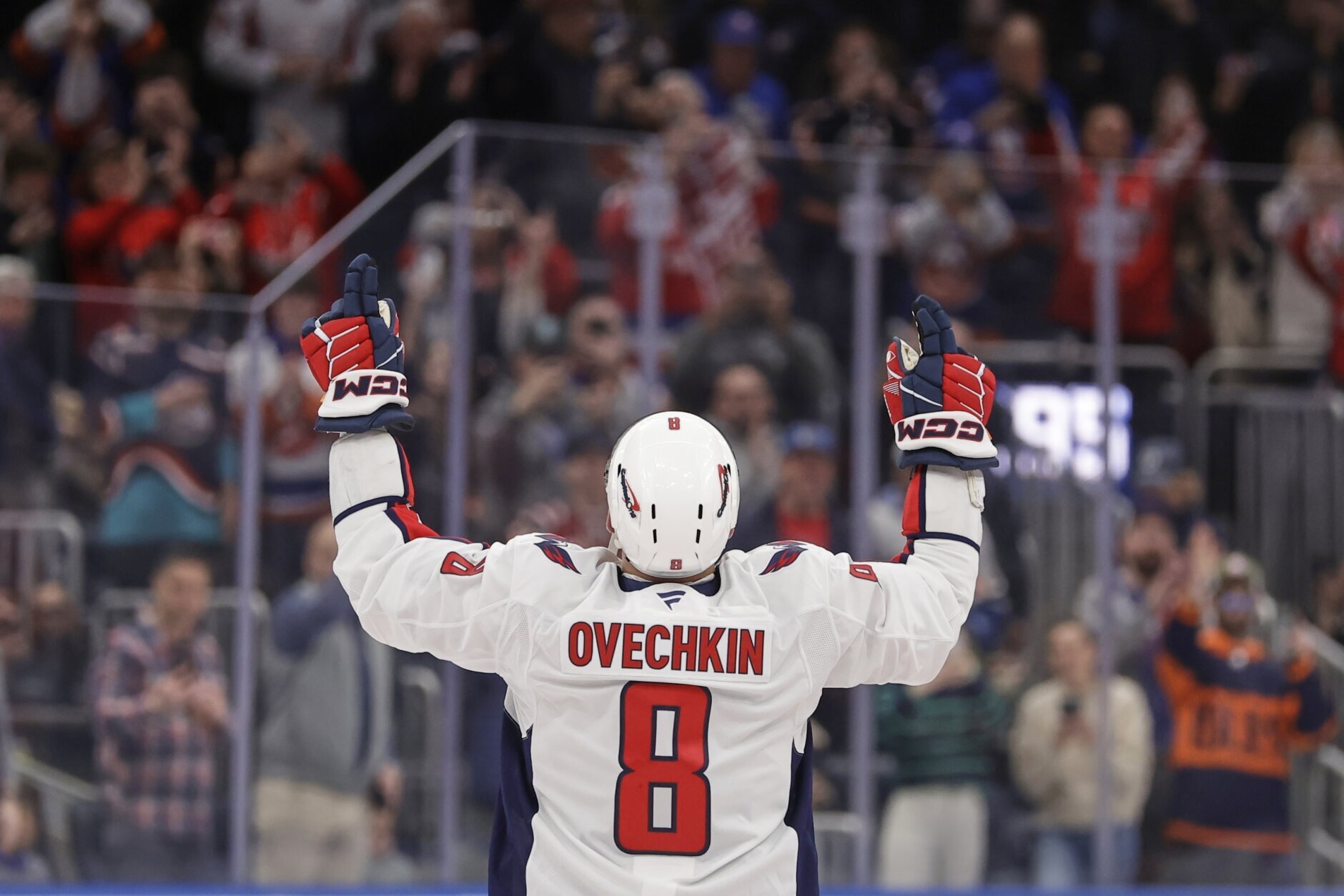 Alex Ovechkin celebrates after scoring his 895th career goal