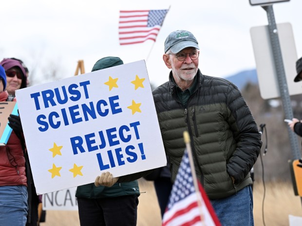 Former U.S. congressman from Colorado David Skaggs was among the protesters on Saturday. (Cliff Grassmick/Staff Photographer)