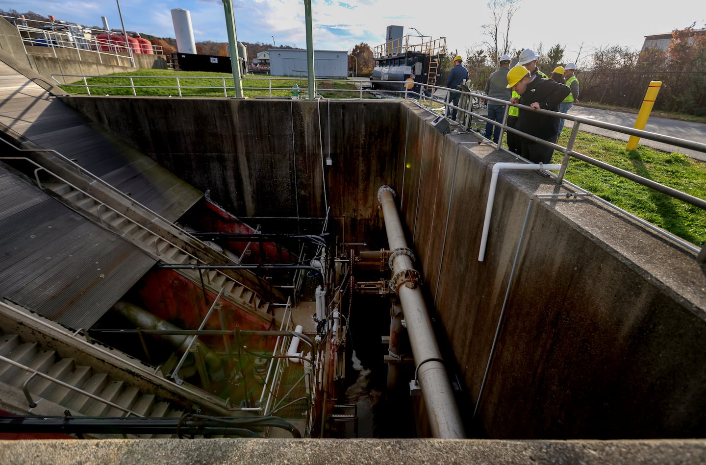 Limestone is mixed in with waste water at the bottom of this tank at the Fall River facility.