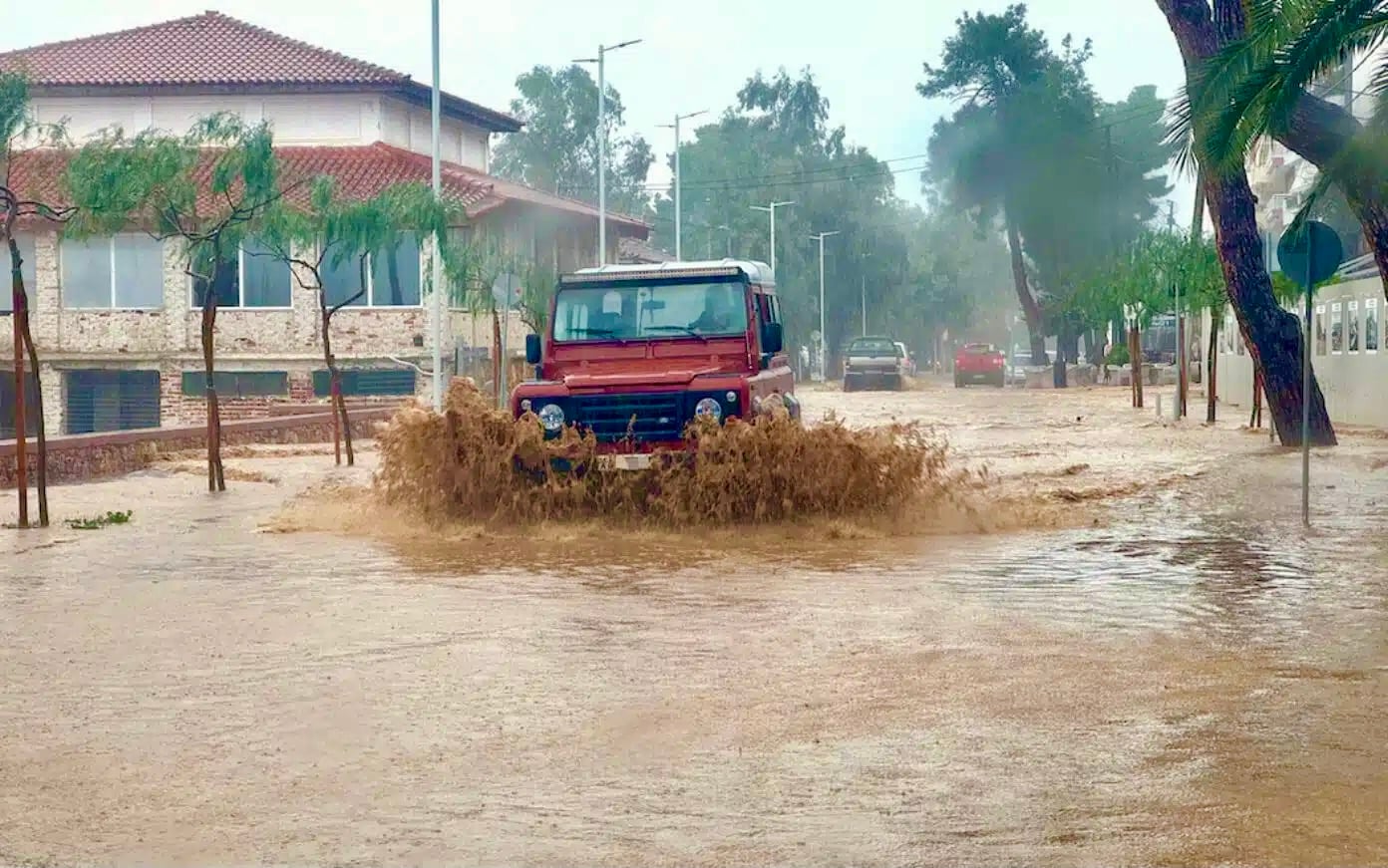 floods rain car greece