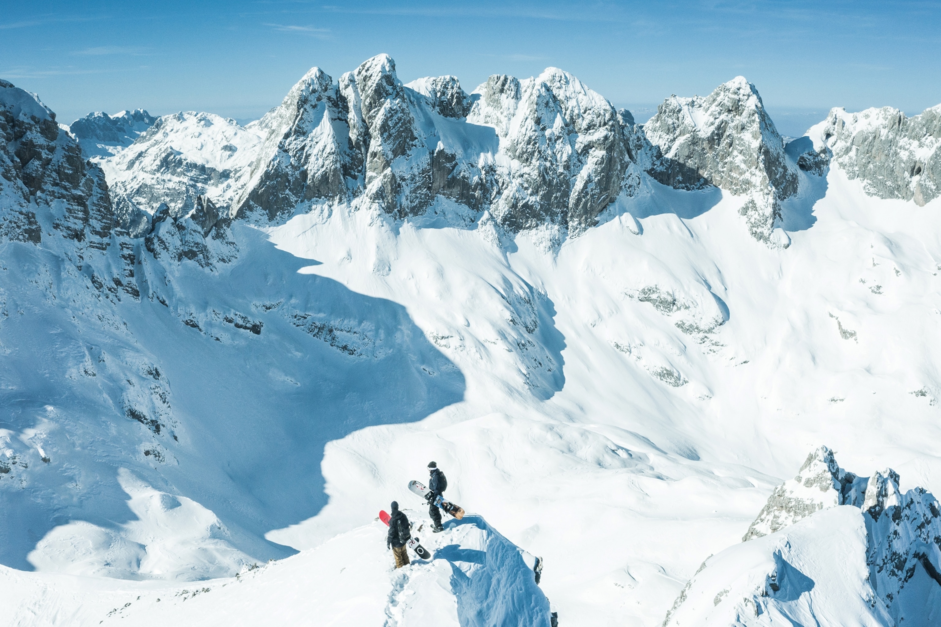 Snowboarders.