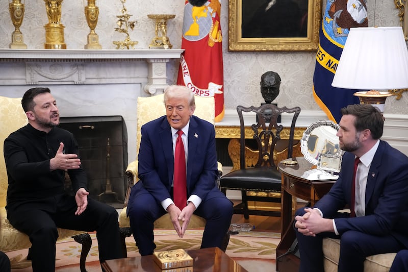 U.S. President Donald Trump (C) and Vice President JD Vance meet with Ukrainian President Volodymyr Zelensky in the Oval Office