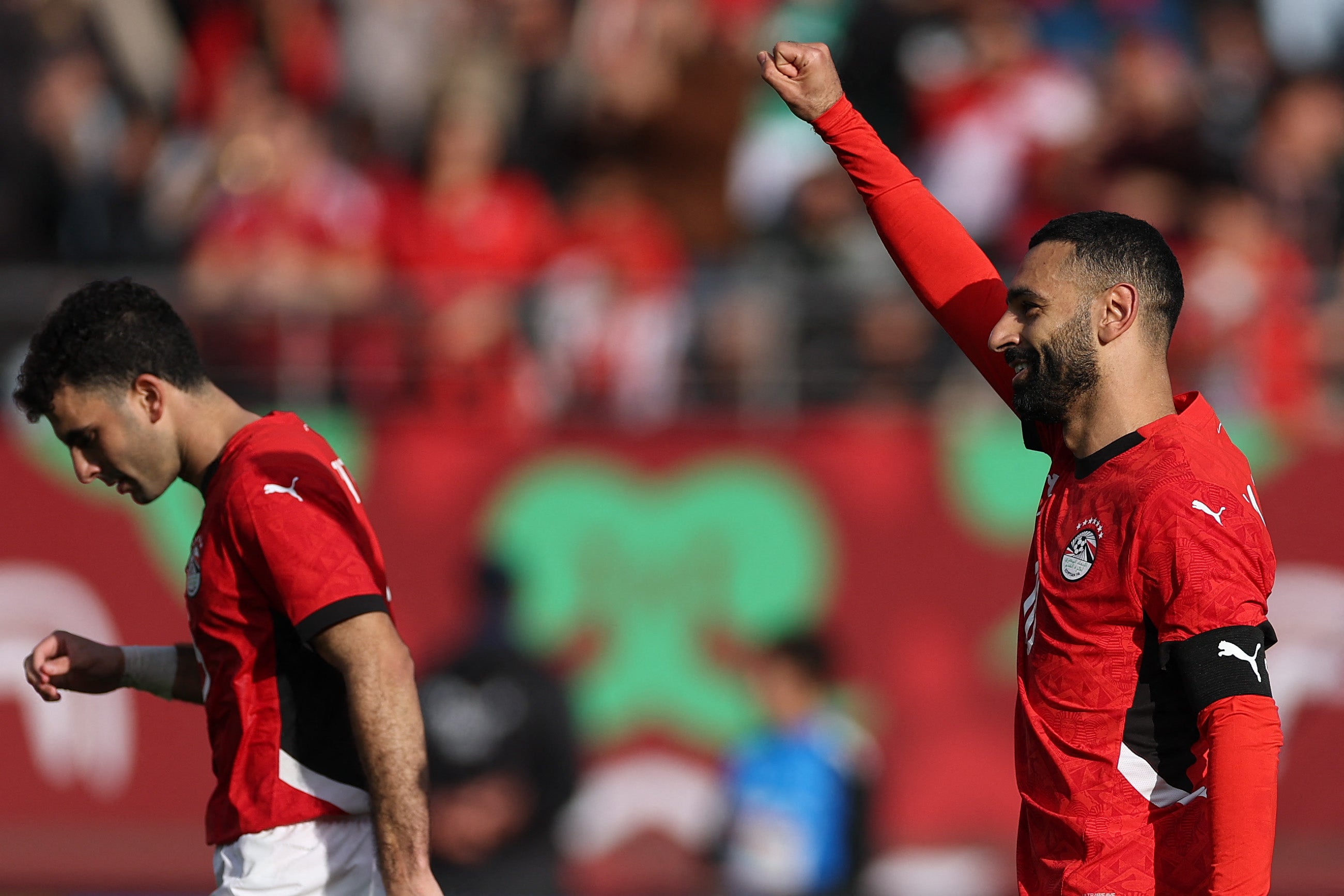 Mohamed Salah celebrates the penalty that sent Egypt through to the knockout stages of the Africa Cup of Nations