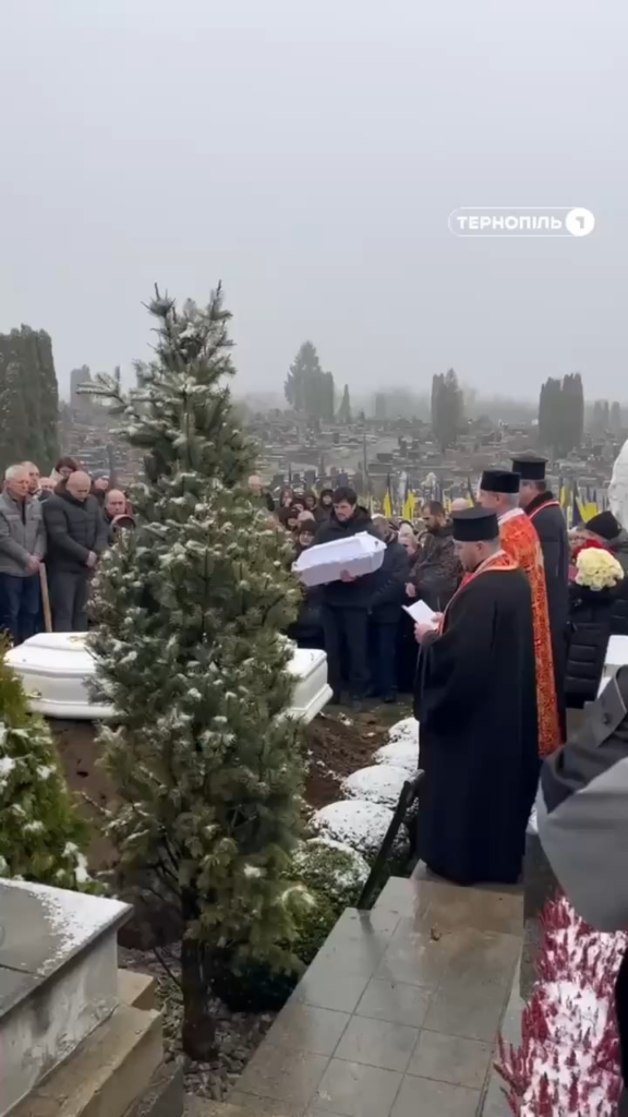 The father of one of the children killed in Ternopil rocks the coffin before the burial. He lost his wife and two children in the attack - November 2025