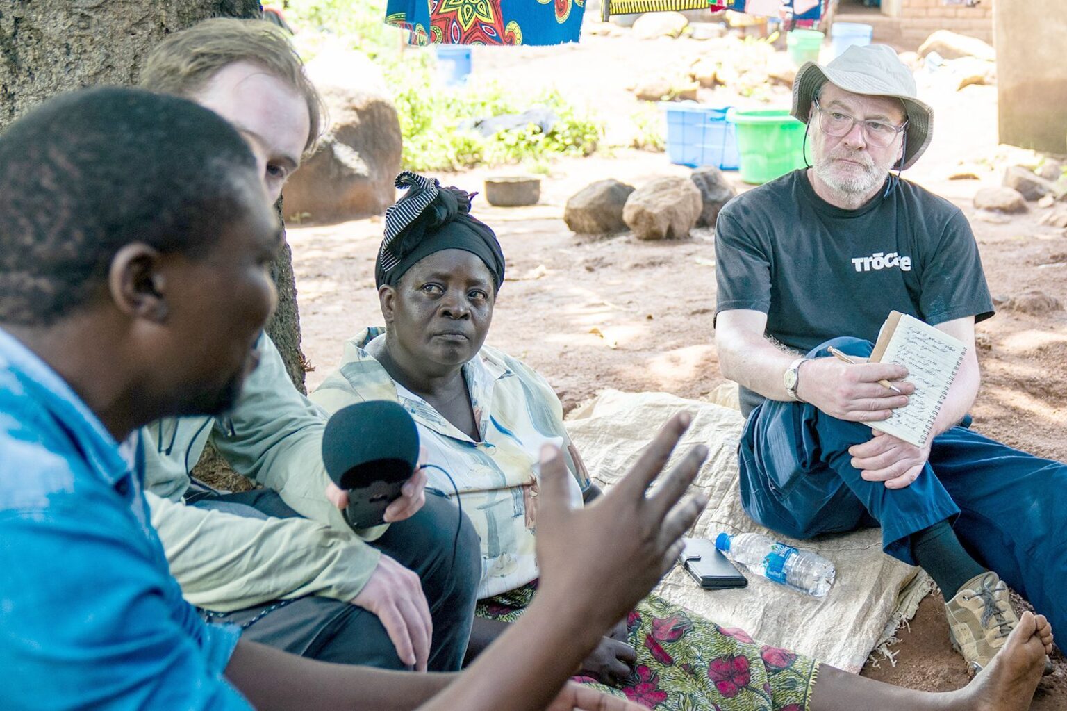 FACTS: David O’Hare listens to the challenges facing farmers in Malawi where the maize harvest  was devastated by a lack of rainfall