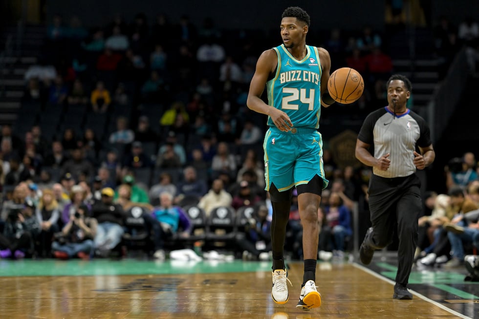 Charlotte Hornets forward Brandon Miller (24) brings the ball upcourt during the second half...