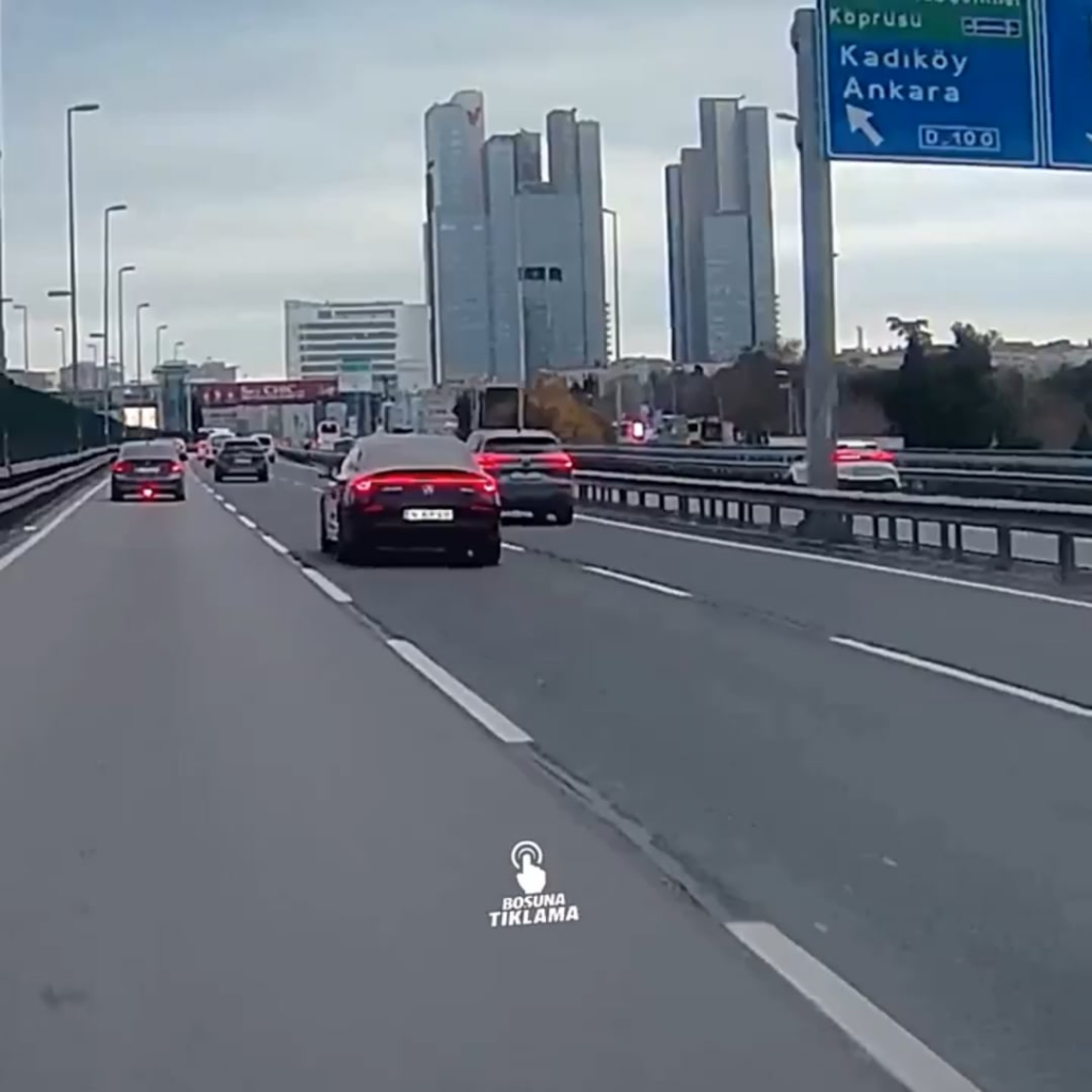 A car driving through Istanbul crashed into barriers and caught fire.