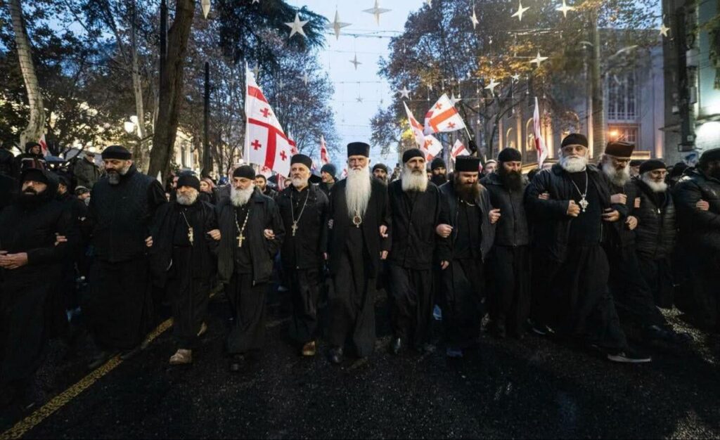 Georgia's Conservative Party (Alt Info) held weekend protest in Tbilisi against UAE development project, thousands marched to Holy Trinity Cathedral led by clergy