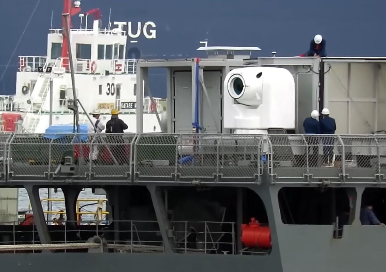 Japan Activates 100-kW Fiber Laser for Live Sea Trials - Fiber laser is a 100-kilowatt-class high-energy weapon, combining ten 10-kW fiber lasers into a single beam, housed in two 40-foot container modules, and equipped with a dome-shaped turret.