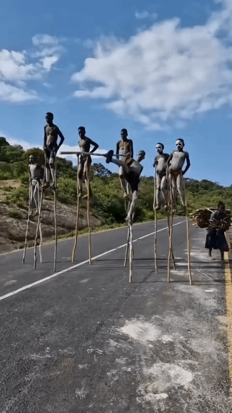 Children of the Banna tribe in Ethiopia walking on stilts