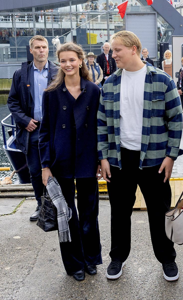 Prince Sverre Magnus and Amalie Giaver MacLeod arriving for a boat trip along the Geiranger Fjord to Geiranger village for the wedding of Princess Martha Louise and Durek Verrett