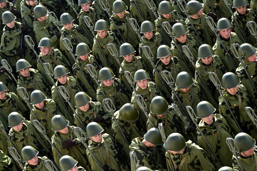 Russian servicemen get ready for the Victory Day parade in Moscow on May 7. Some of Russia’s more deprived areas have experienced an uplift during the war, in part because of huge pay checks going to Russian soldiers and their families.