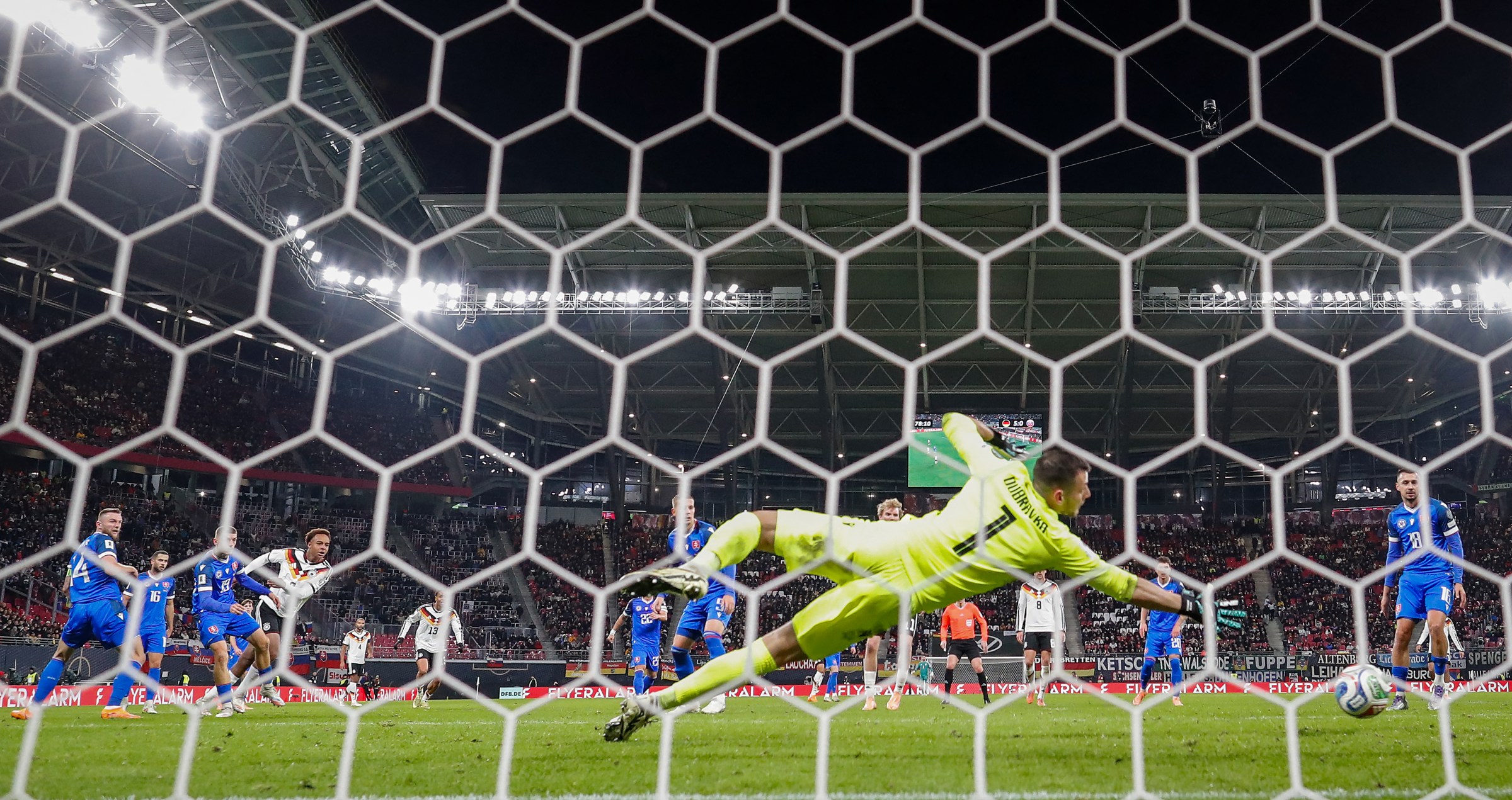 Germany’s midfielder #09 Assan Ouedraogo (4thL) scores his team’s sixth goal past Slovakia’s goalkeeper #01 Martin Dubravka during the FIFA World Cup 2026 European qualification Group A football match between Germany and Slovakia, at the Red Bull Arena in Leipzig, eastern Germany on November 17, 2025. (Photo by Ronny HARTMANN / AFP) (Photo by RONNY HARTMANN/AFP via Getty Images)