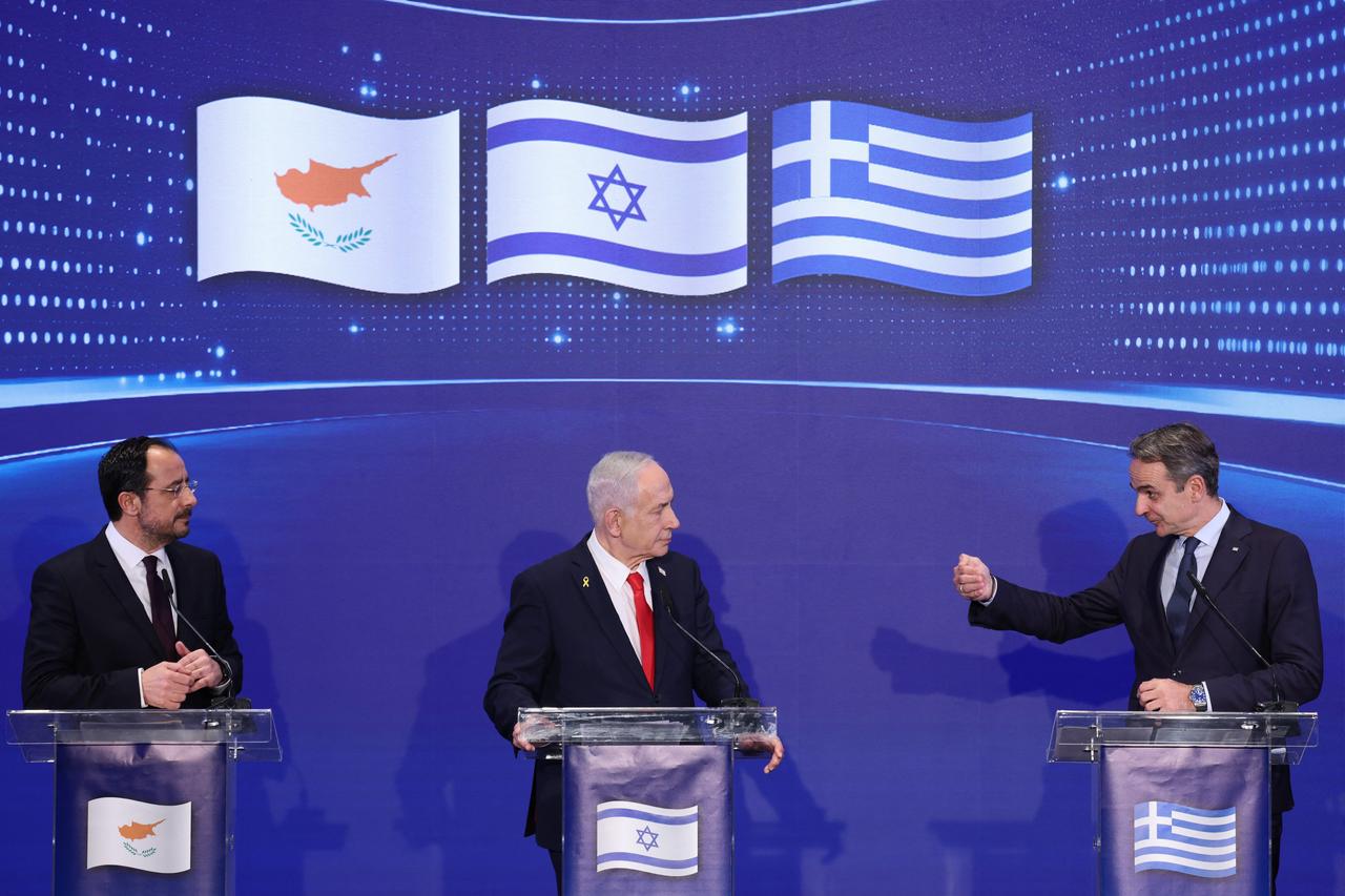 Greek Prime Minister Kyriakos Mitsotakis (R) speaks during a joint press conference with Israeli Prime Minister Benjamin Netanyahu (C) and Greek Cypriot Administration President Nikos Christodoulides (L) after a trilateral meeting in Jerusalem on Dec. 22, 2025. (AFP Photo)